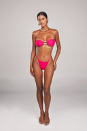 She Wears Pearls ruched strapless bandeau top in Hot Fuchsia with pearl detail — front view